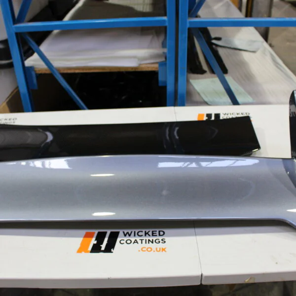 Car exterior parts coated in carbon fibre painted silver