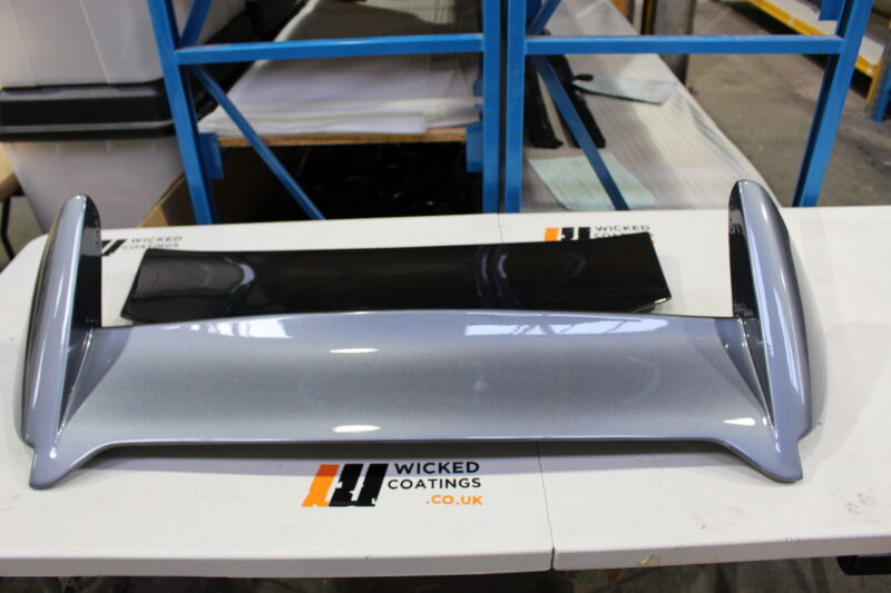 Car exterior parts coated in carbon fibre painted silver