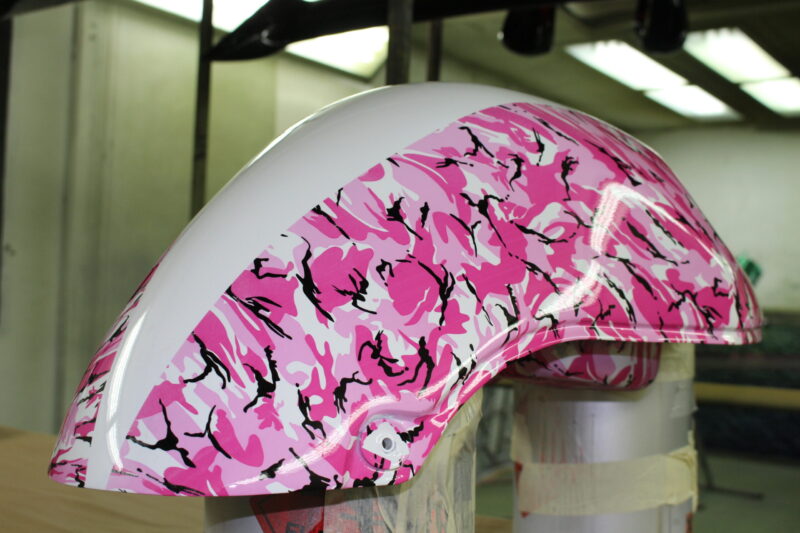 Motorbike tank painted in white, coated in fancy como hydrographic film.