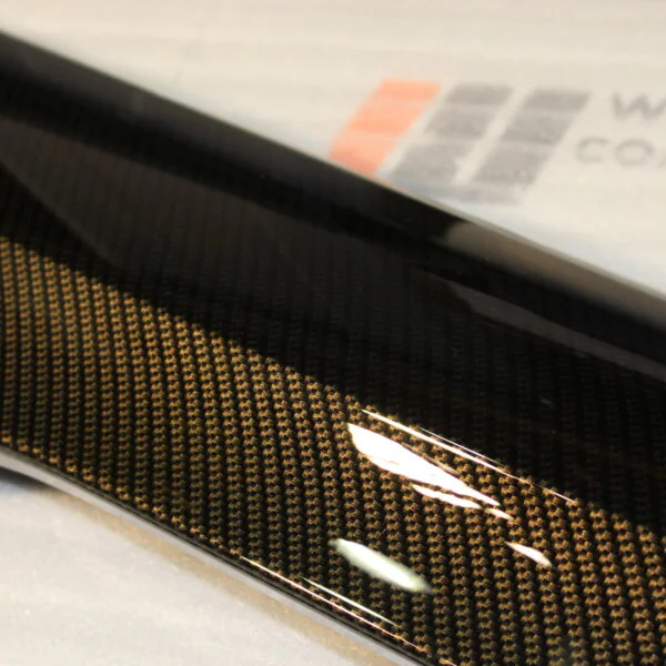 Car exterior element coated in carbon fibre