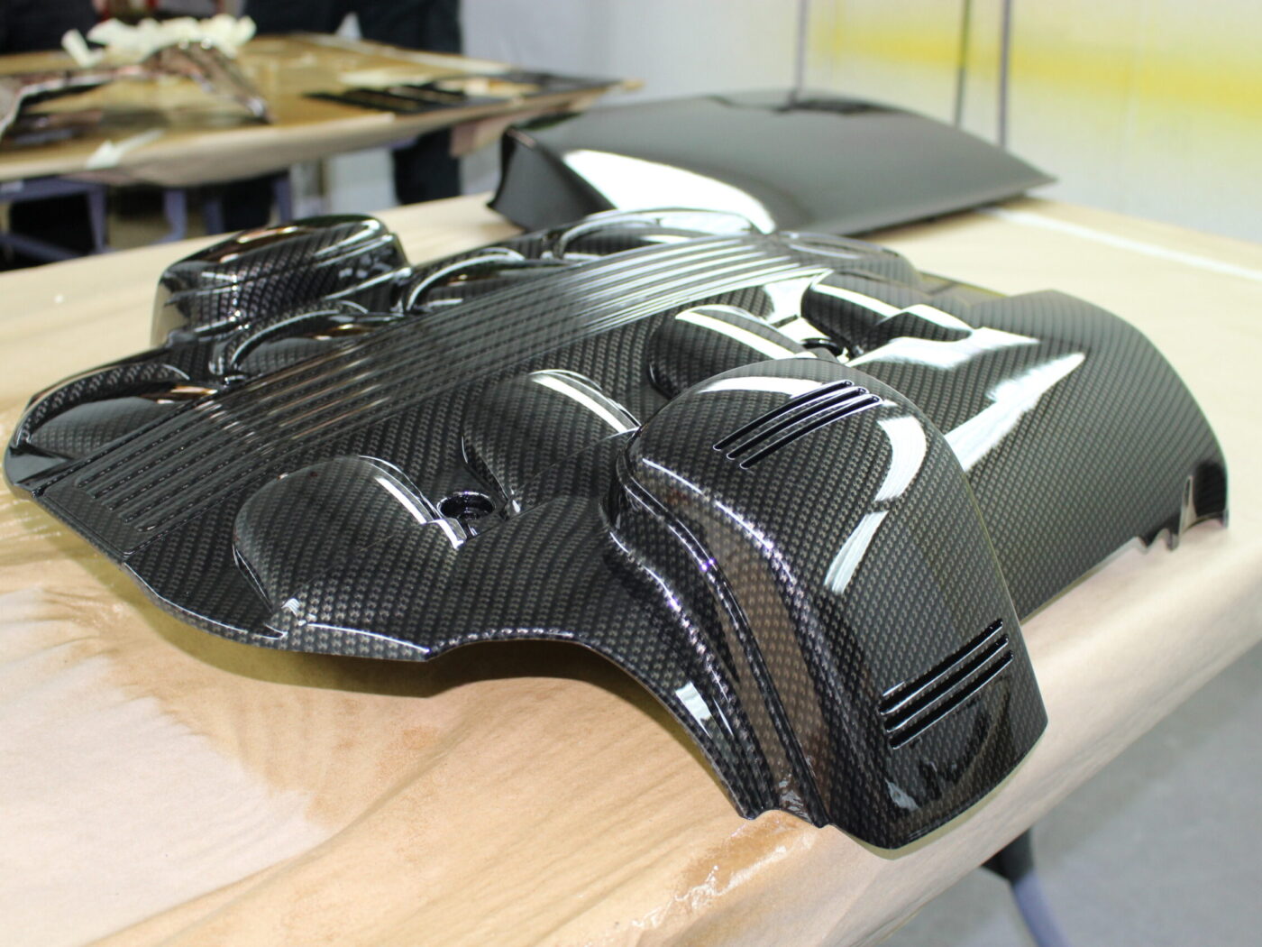 Engine parts coated in carbon fibre