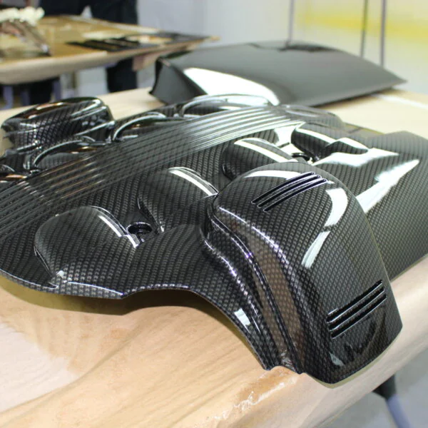 Engine parts coated in carbon fibre