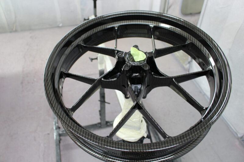 Motorbike wheels coated in carbon fibre