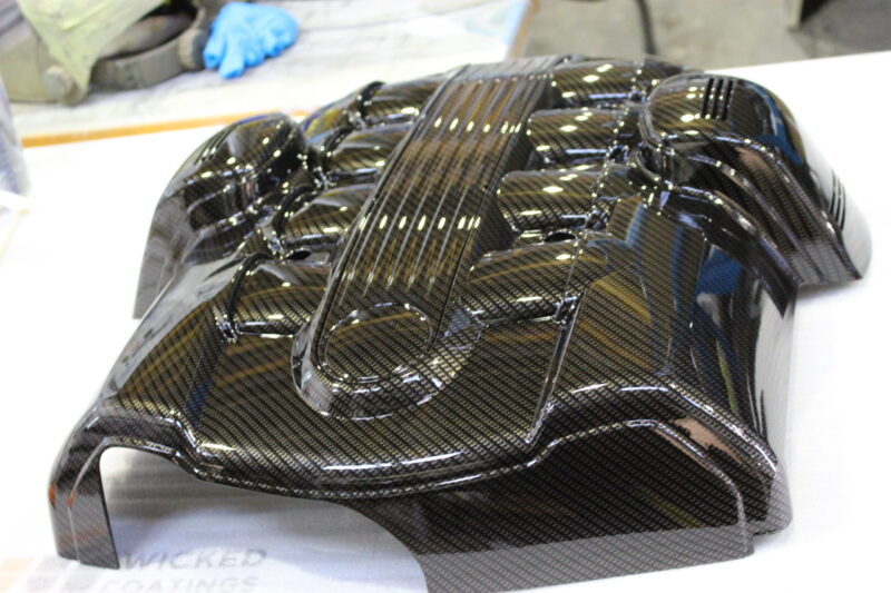 BMW engine elements coated in carbon fibre
