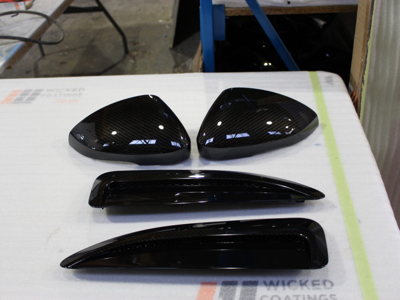 Car exterior elements coated in carbon fibre