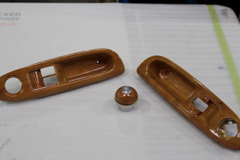 Car interior elements coated in wood
