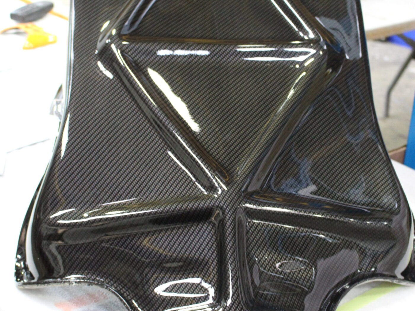 Motorbike parts coated in carbon fibre