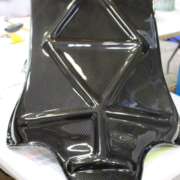 Motorbike parts coated in carbon fibre