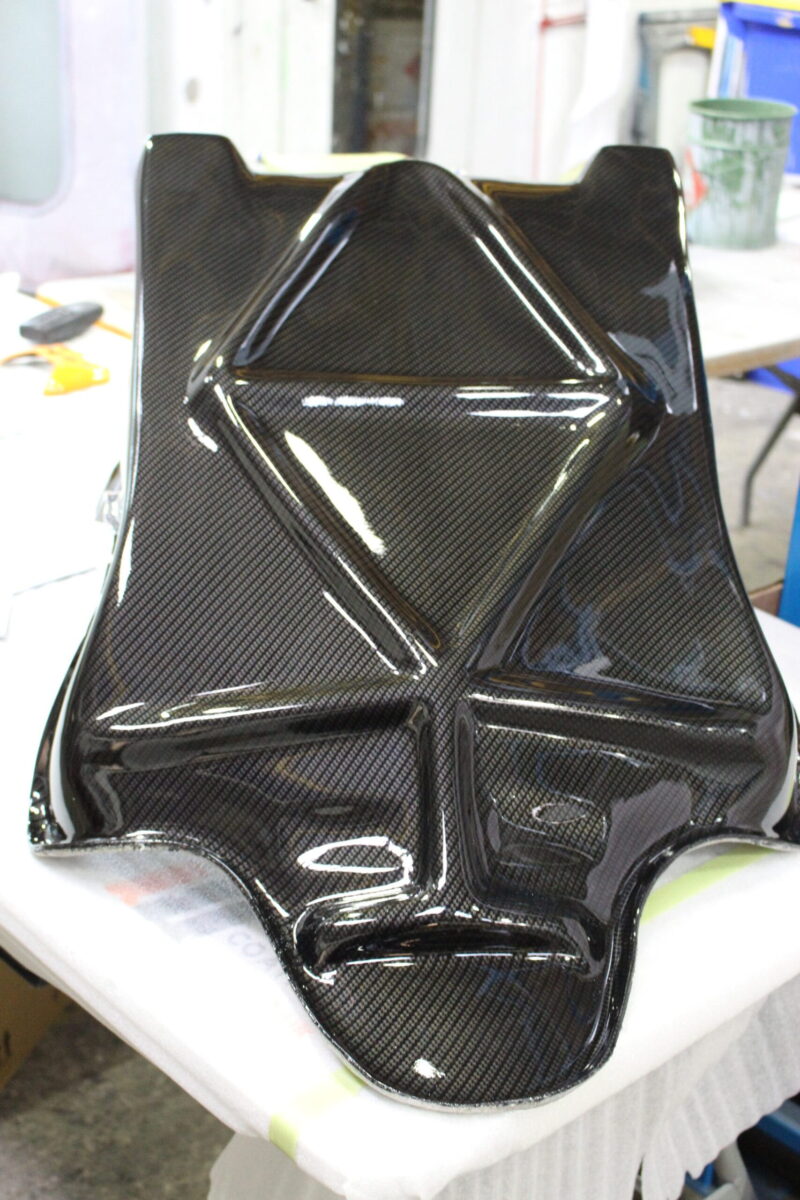 Motorbike parts coated in carbon fibre