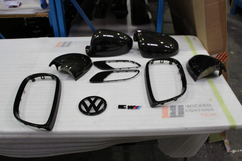 VW and BMW exterior elements coated in carbon fibre