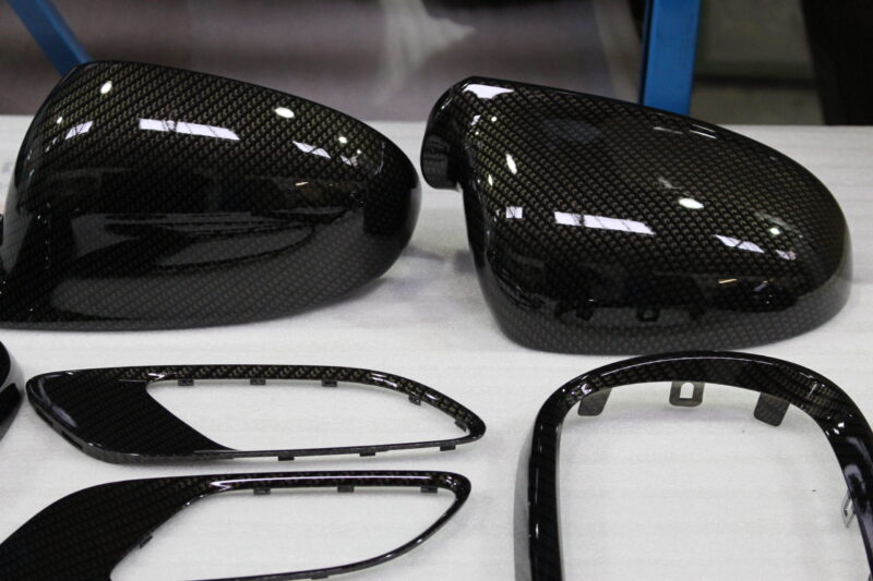 VW and BMW exterior elements coated in carbon fibre