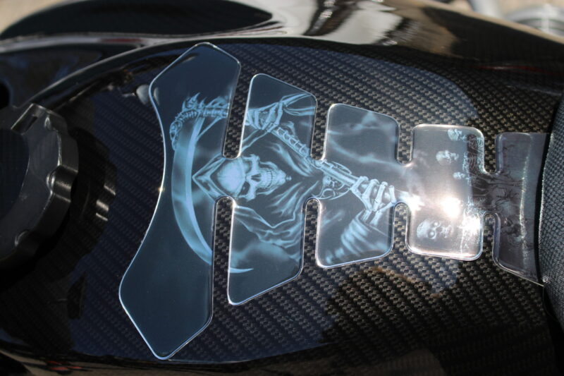 Motorbike tank coated in carbon fibre