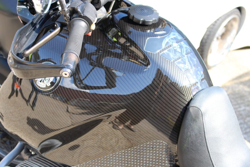 Motorbike tank coated in carbon fibre