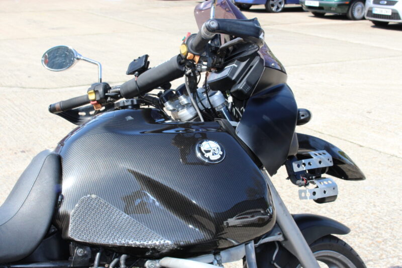 Motorbike tank coated in carbon fibre