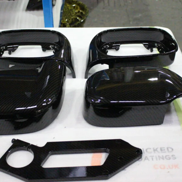 Car mirrors cover coated in carbon fibre
