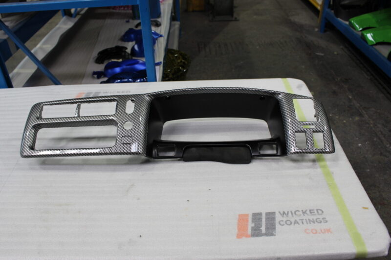 Dashboard coated in carbon fibre painted silver