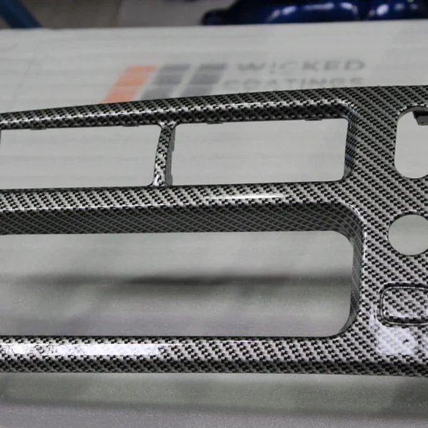 Dashboard coated in carbon fibre painted silver