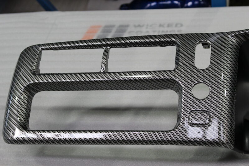 Dashboard coated in carbon fibre painted silver