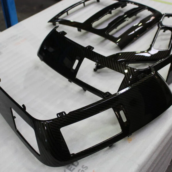 VW dashboard elements coated in carbon fibre