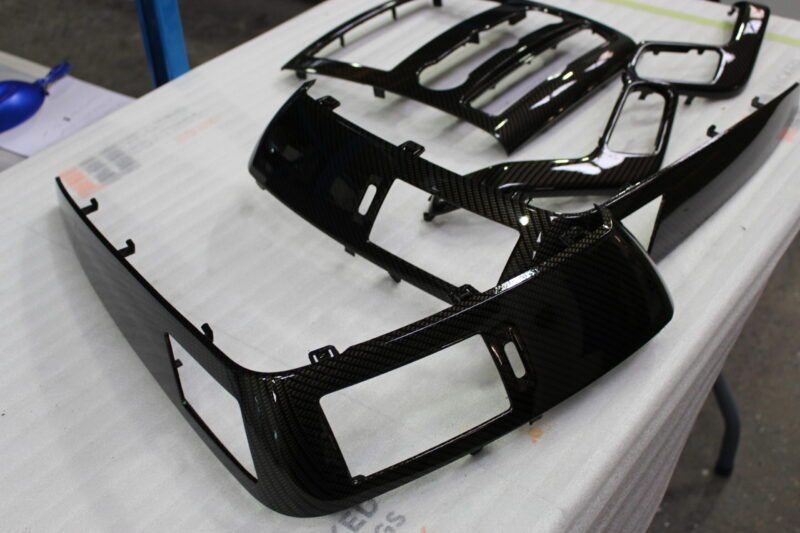 VW dashboard elements coated in carbon fibre