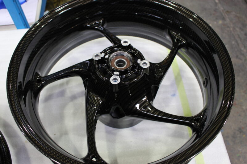 Motorbike wheels coated in carbon fibre