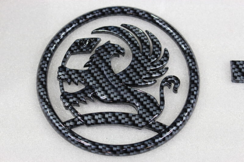 Vauxhall VX 220 Turbo badge coated in carbon fibre