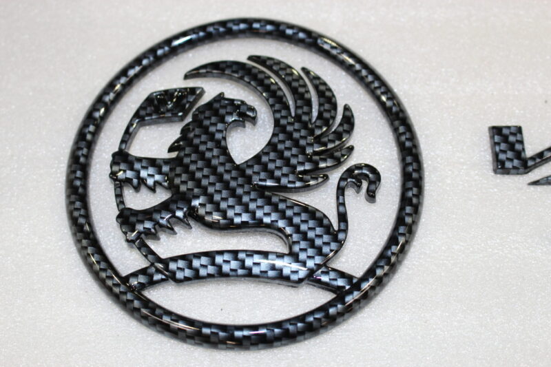 Vauxhall VX 220 Turbo badge coated in carbon fibre
