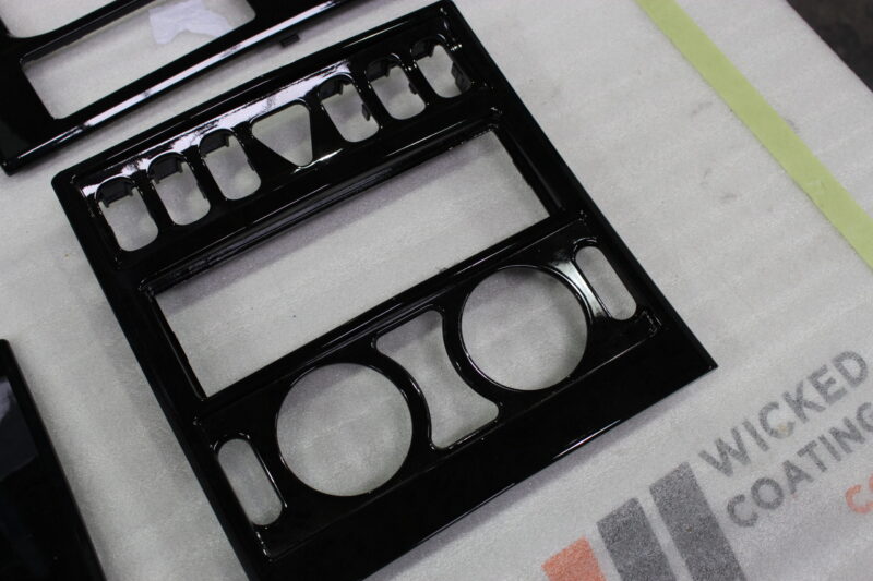 Car dashboard elements painted black