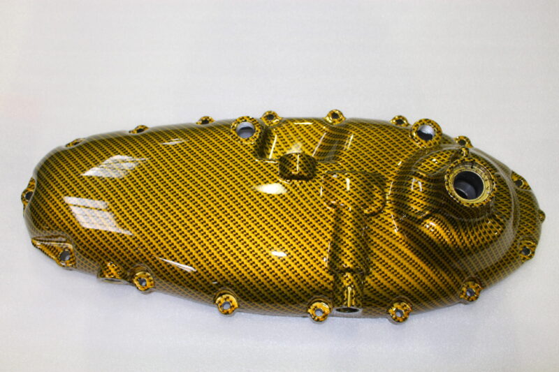 Motorbike parts coated in carbon fibre painted gold