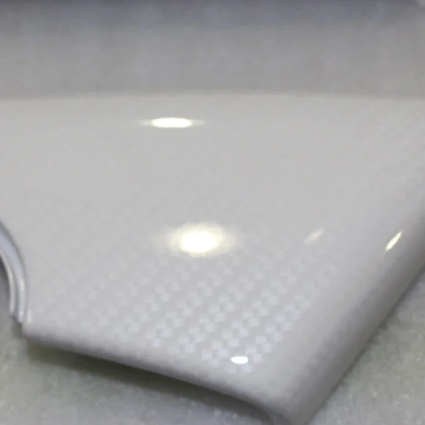 Parts of car interior coated in carbon painted white