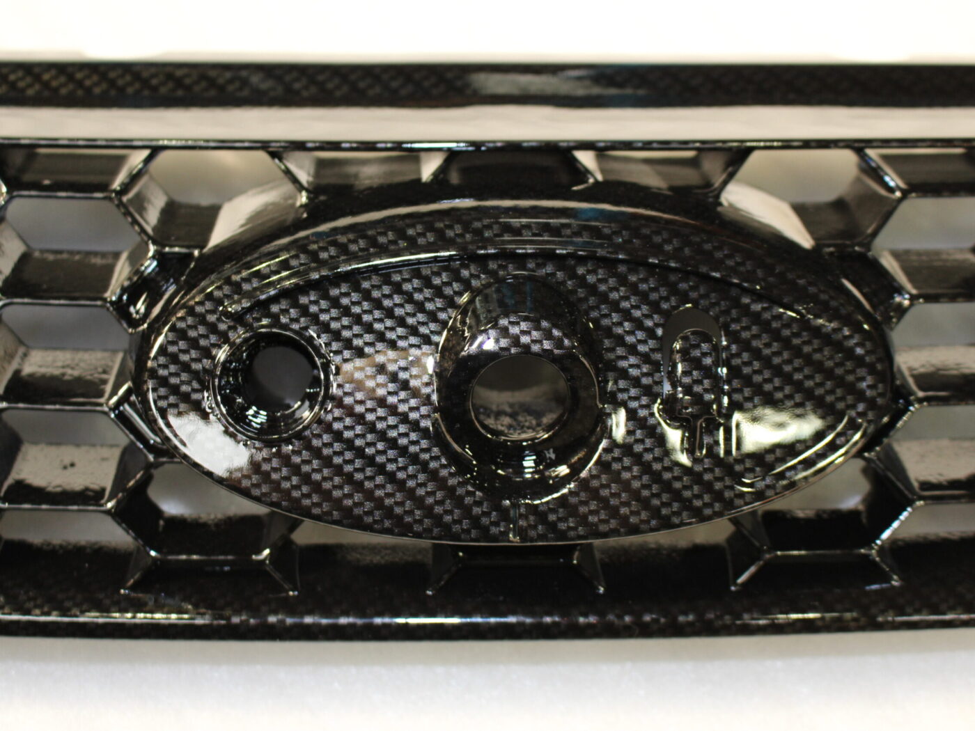 Ford Focus radiator cover coated in carbon fibre