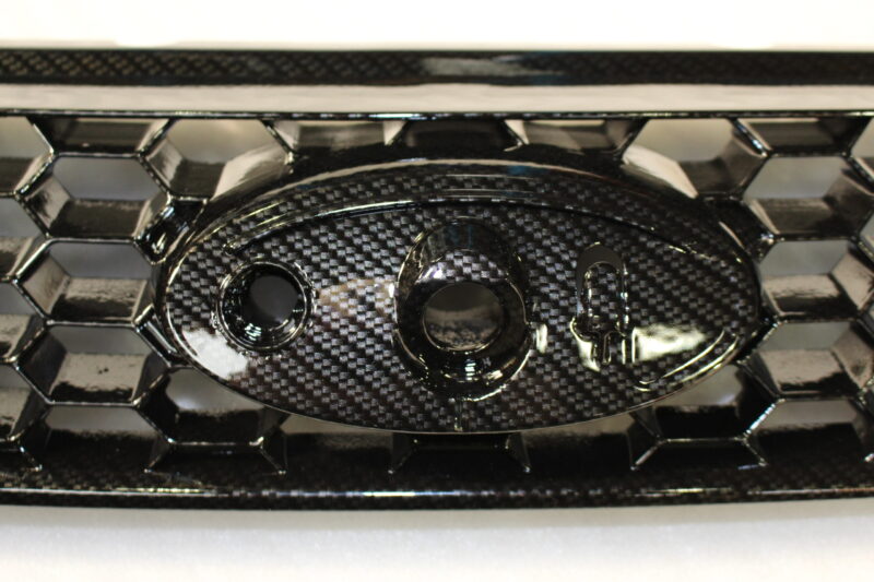 Ford Focus radiator cover coated in carbon fibre