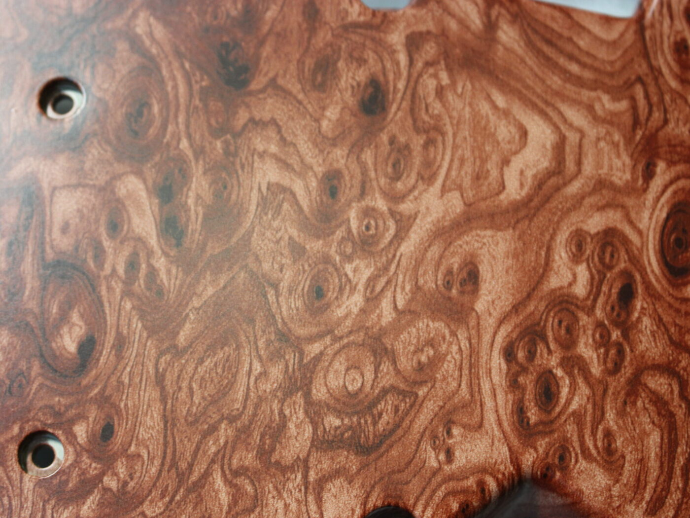 Parts of dashboard coated in wood