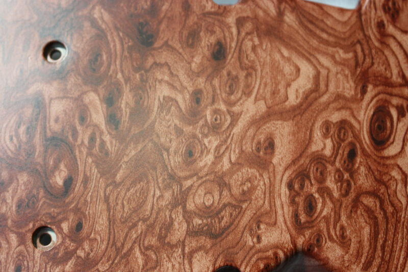 Parts of dashboard coated in wood