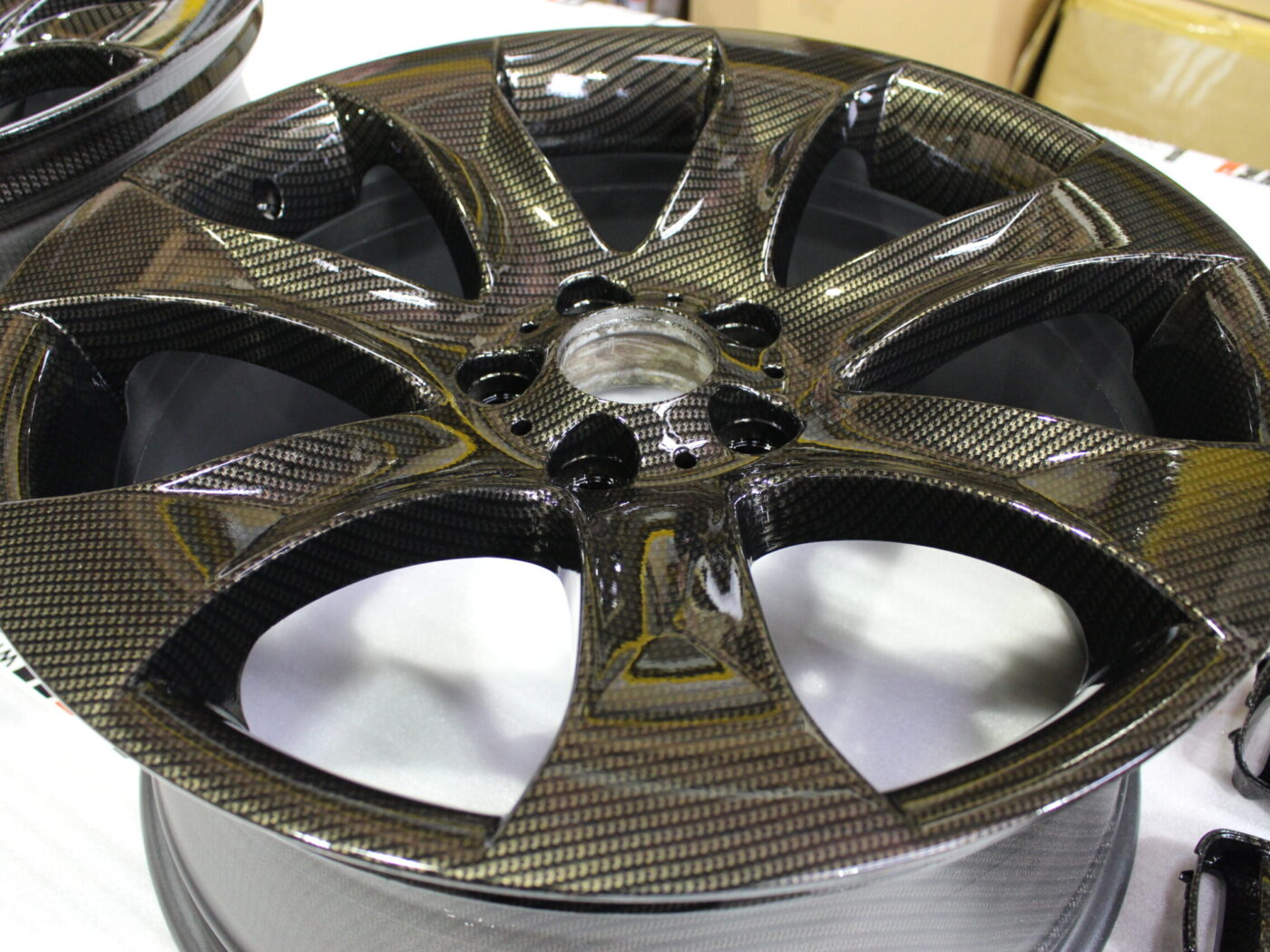 BMW alloy wheels coated in carbon fibre