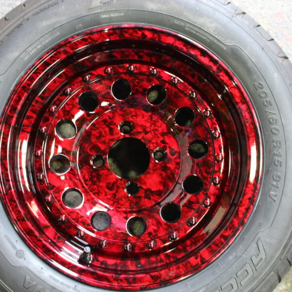 Car wheels coated in skull painted red