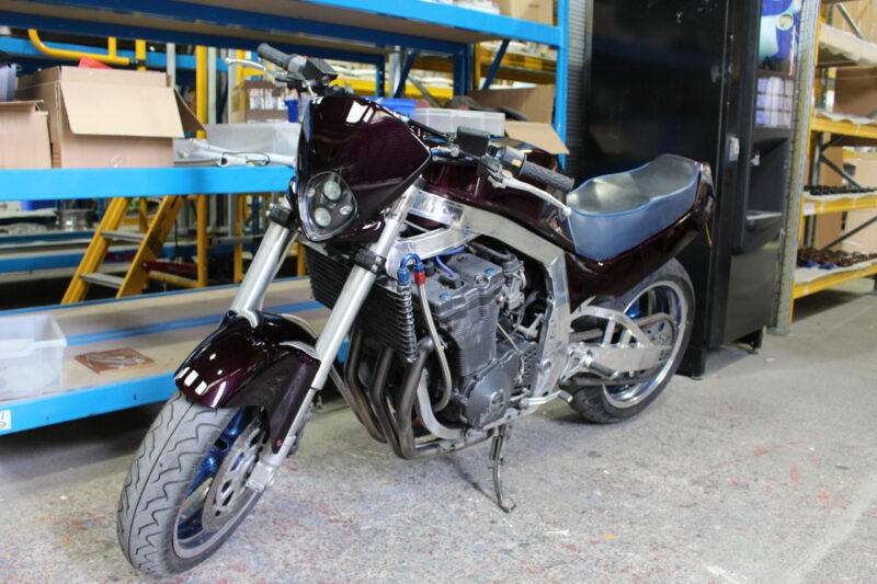 Suzuki coated in dark wood