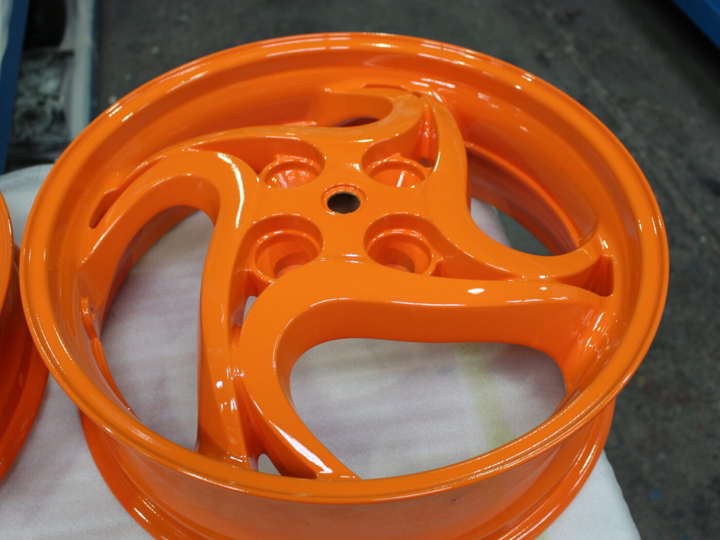 Motorbike alloy wheels painted orange
