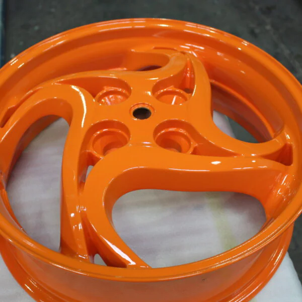 Motorbike alloy wheels painted orange
