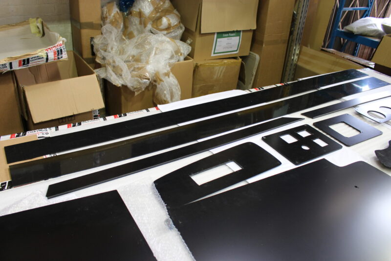 Car Dashboard Elements Coated In Wood