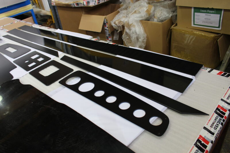 Car Dashboard Elements Coated In Wood