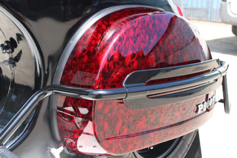 Vespa P200E skuter coated in dark skulls