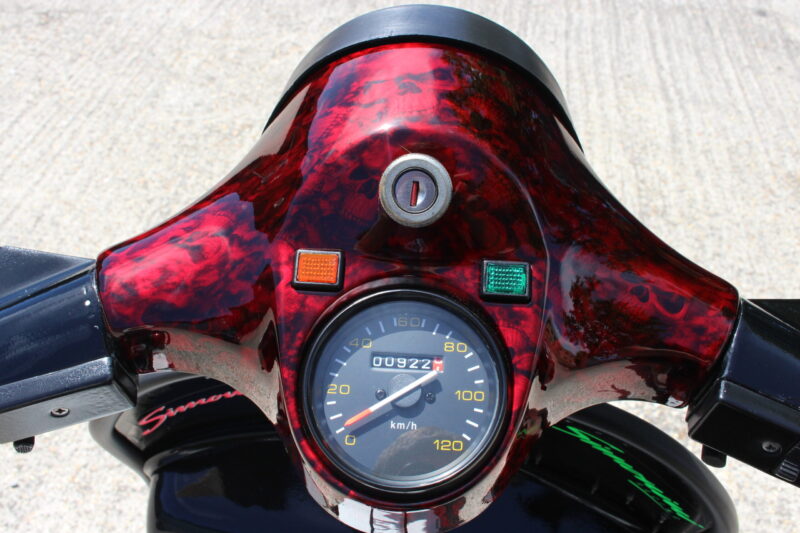 Vespa P200E skuter coated in dark skulls