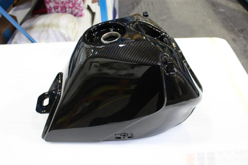 Motorbike tank coated in carbon fibre