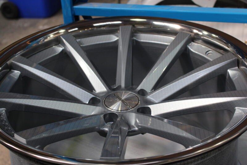 Car Alloy Wheels (Vossen) Coated In Carbon Fibre Painted Grey