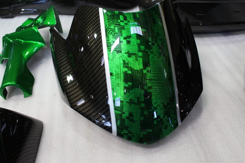 Triumph coated in carbon fibre painted green ( Pool Bike Show )