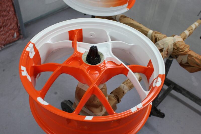KTM Racing wheels painted white and orange