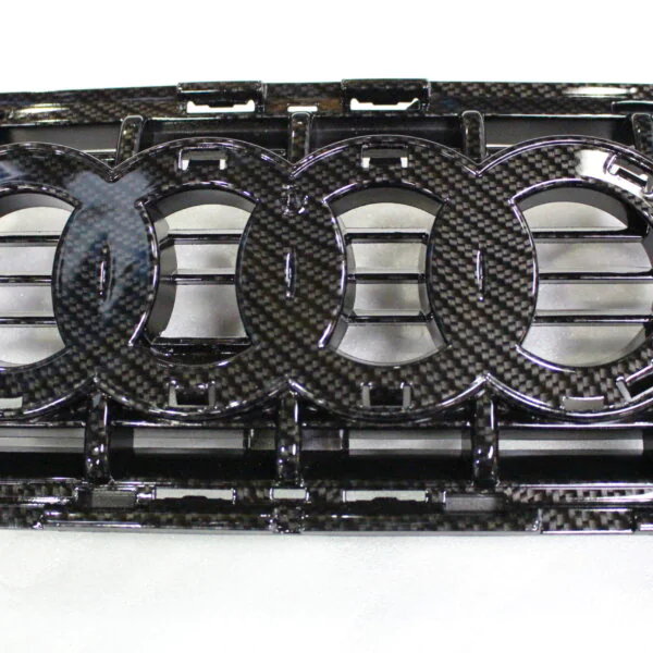 Audi radiator cover coated in carbon fibre