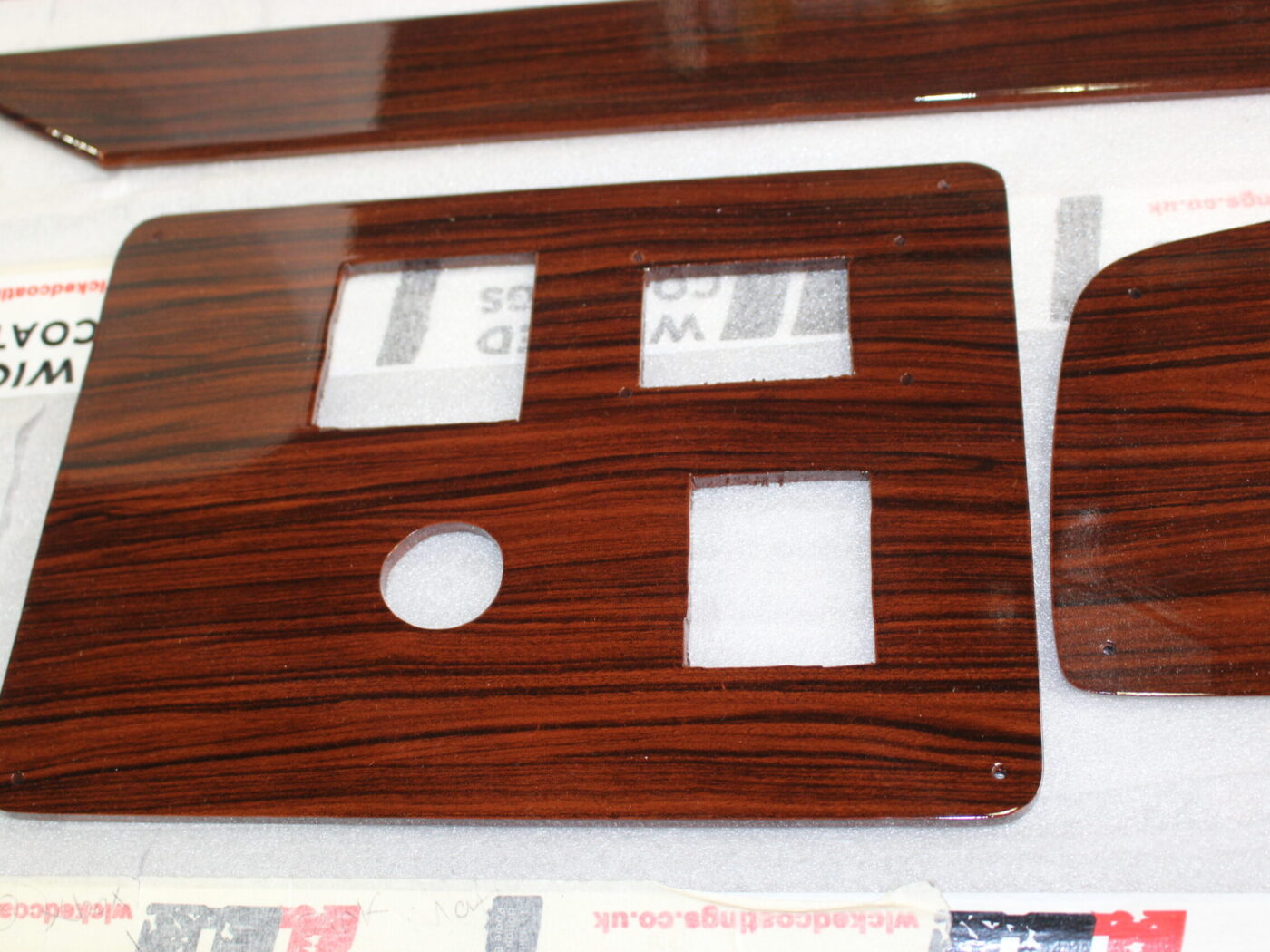 Car Dashboard Elements Coated In Wood
