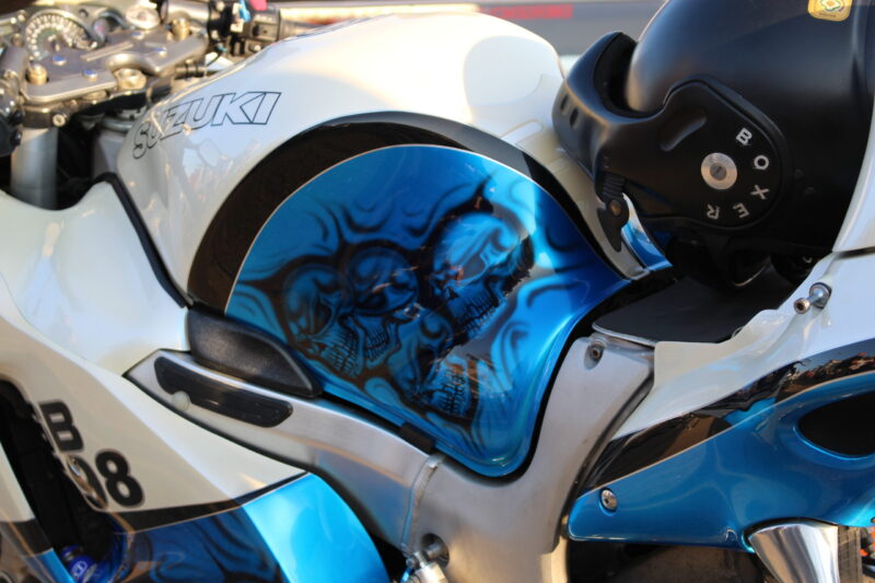 Suzuki coated in skulls painted blue